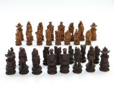 Chinese figural chess set, each piece approximately 10cm tall, in original box