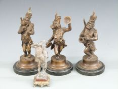 Three novelty dog soldiers depicted as musicians, 25cm tall, together with the 'Listening' Hussar