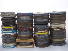 Approximately 65 16mm cine film reels including examples titled 'Neptune Nonsense', 'Felix the Cat',