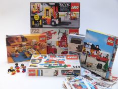 Six Lego building sets 30, 107, 263, 379, 722 and Technic 8843, all in original boxes