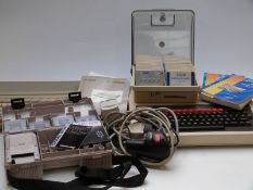 Atari 520ST personal computer together with various games and a BBC microcomputer in original