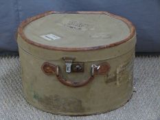 Vintage leather bound hat box with railway and shipping labels