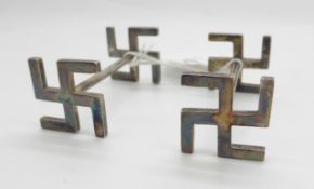 WWII German West Wall medal together with a pair of swastika knife rests marked silver and a badge