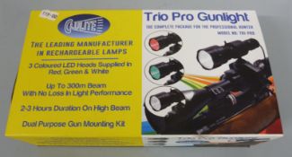 Clulite Trio Pro gunlight with three coloured LED heads, new in original box.