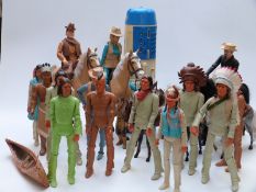 A large collection of cowboy and Indian action figures together with related horses and The