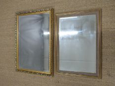 Two gilt mirrors with bevelled glass, larger 102 x 71 overall