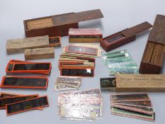 A collection of mainly educational magic lantern slides / film strips including some boxed sets