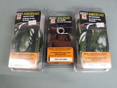 Three Hoppe's Bore Snake shotgun cleaning kits two 20 bore and one 6mm/ .243 calibre, all new in
