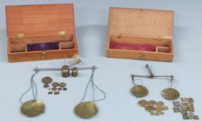 Two sets of 18thC / 19thC travelling beam scales both with Avery troy ounce weights. Width of larger