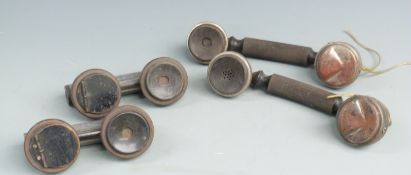 Four telephone handsets, one marked Steco DV1918 of extending design