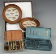 Two fly fishing tins, one with contents together with wooden fly box and two framed and glazed fly