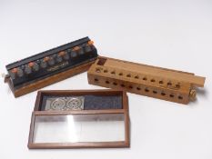 Three vintage calculators, one a Denominator, length 26cm, another marked as being made in