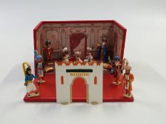 Twelve CBG Mignot diecast model Arabian Palace figures and accessories, in original diorama