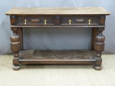 Carved oak sideboard having two drawers, supported on bulbous carved legs united by a shelf, W137