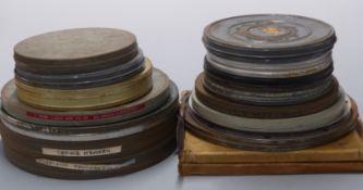 Ninteen 16mm cine film reels including examples marked 'Salute to the Soviet', 'The Ice Witch', '