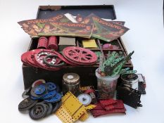 A large collection of Meccano parts, motors, pulleys, propellers etc together with five sets of