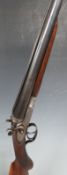Unnamed 16 bore side by side hammer action shotgun with engraved locks, double trigger, chequered