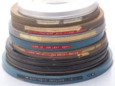 Ten 16mm cine film reels including examples marked 'Time is Don Levy',  'Rhodesia Countdown, Mark