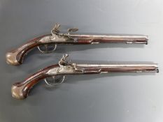 A pair of C Charlot of Adelsheim Germany flintlock hammer action holster pistols with named locks,