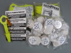 A collection of Pathfinder night time day glo shooting and marking systems together with a large