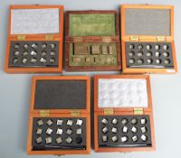 Five modern imperial county standard weight sets, one Essex, the others Buckinghamshire with various