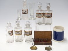 Quantity of apothecary jars or bottles, travelling beam scales etc