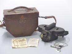WWII era mechanical Filmo cine camera by Bell, Howell & Co, Chicago, in fitted leather case