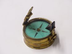 Poles brass clinometer and compass no 27 by Elliot Brothers, Strand, London, 7.5cm diameter