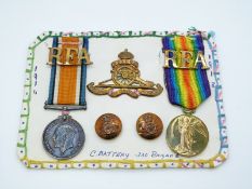 British Army WWI medals comprising War Medal and Victory Medal, named to 711538 Gunner H G Harman,