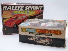 Two Scalextric model slotcar racing sets Grand Prix 8 C559 and Rallye Sprint, both in original