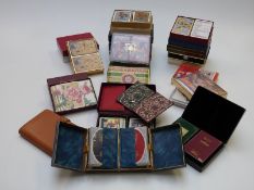 Twenty-four vintage double decks of playing cards including some advertising related, all in