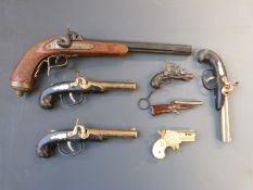 Seven various replica pistols, two in the form of lighters