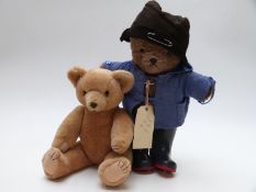 Two vintage Teddy bears comprising one Paddington and one with blonde fur and jointed limbs, each