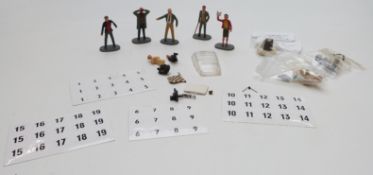 Five Tri-ang Scalextric model motor racing/ slot car figures together with various James Bond set