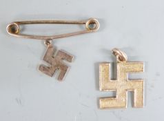 Two small 9ct gold Swastikas, weight 2.4g