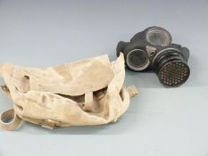 WWI standard issue gas mask with canvas bag dated 1942