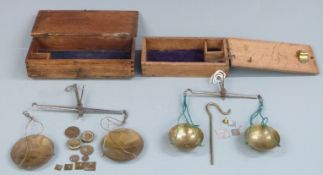 Two sets of 18thC / 19thC travelling beam scales including various apothecary weights
