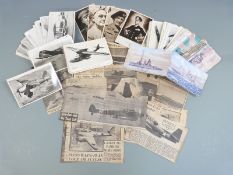 A collection of WWII interest postcards including naval ships, aircraft, people etc