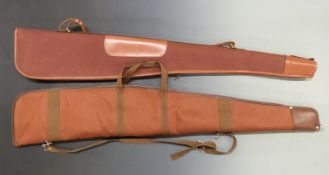Two leather bound wool lined shotgun slips with shoulder straps, one Parsons & Son Birmingham,