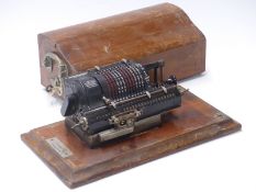Britannic vintage mechanical calculator by Guys Calculating Machines No 1937 in wooden carry case