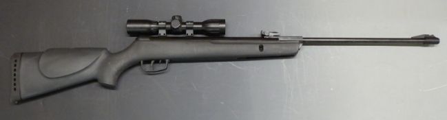 Gamo Hornet .22 air rifle with semi-pistol grip, raised cheek piece and Gamo 4x32 WR scope, serial