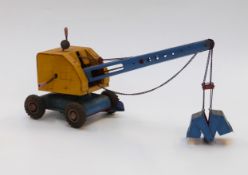 MFZ US Zone Germany pressed steel model crane with yellow body and blue and red chassis and boom