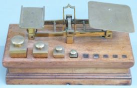 Waterlow & Sons, London, Victorian postage scales with square tapering weights from 6oz to 2/3oz, on