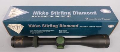 Nikko Stirling Diamond 4-12x42 rifle scope, new in original box.