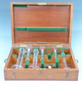 Edward VII cased set of Monmouthshire County Council standard glass measuring cylinders, largest 1/2