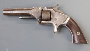 Deactivated  Smith & Wesson Model 1 2nd issue seven shot .22 rim-fire revolver with sheath