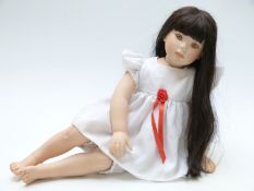 Donna Rubert Chyna bisque doll Helen with closed mouth, fixed light brown eyes and long black hair