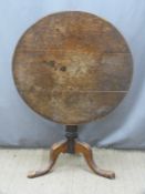 A 19thC oak tilt top table, diameter 82cm
