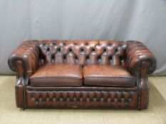 Oxblood leather Chesterfield sofa bed, length 170cm