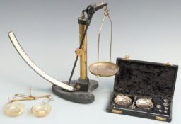 Griffin & George swinging weight type scales, travelling beam scale and a cased travelling beam
